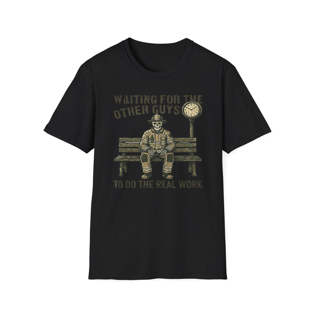 Brown t-shirt with a small graphic on the chest against a white background Waiting For The Others Guys To Do The Real Work